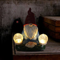 Solar LED resin dwarf doll garden ornament measuring 27x20cm with faceless old man design