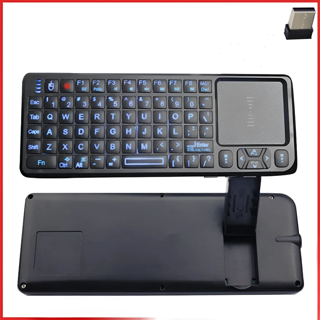 Black wireless laser teaching mini keyboard with touch screen and backlit keys on a desk.