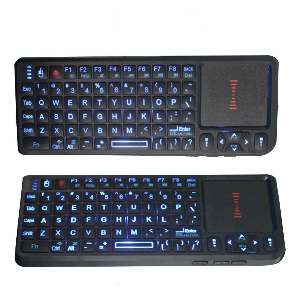 Black wireless laser teaching mini keyboard with touch screen and backlit keys on a desk.