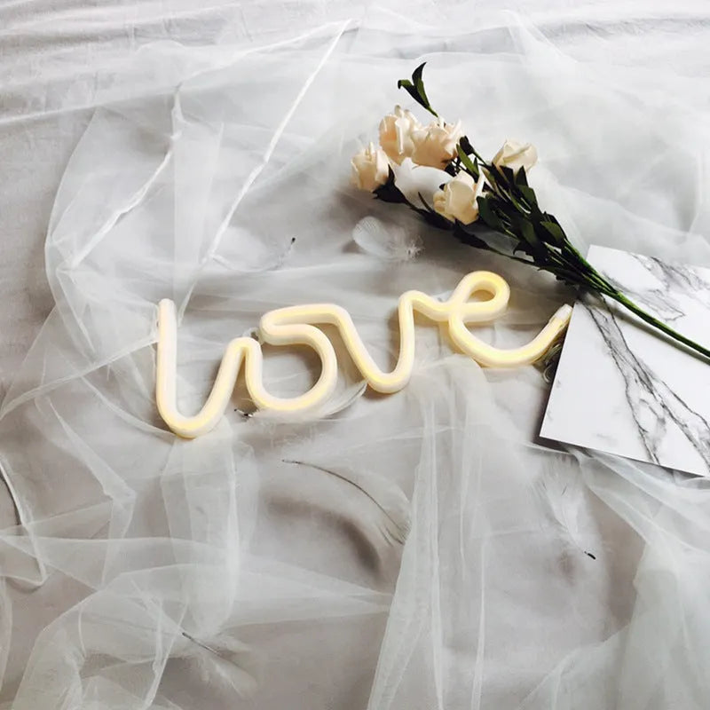 LED neon sign light in Love shape with pink or warm white colour options, powered by battery or USB