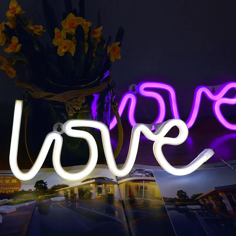 LED neon sign light in Love shape with pink or warm white colour options, powered by battery or USB