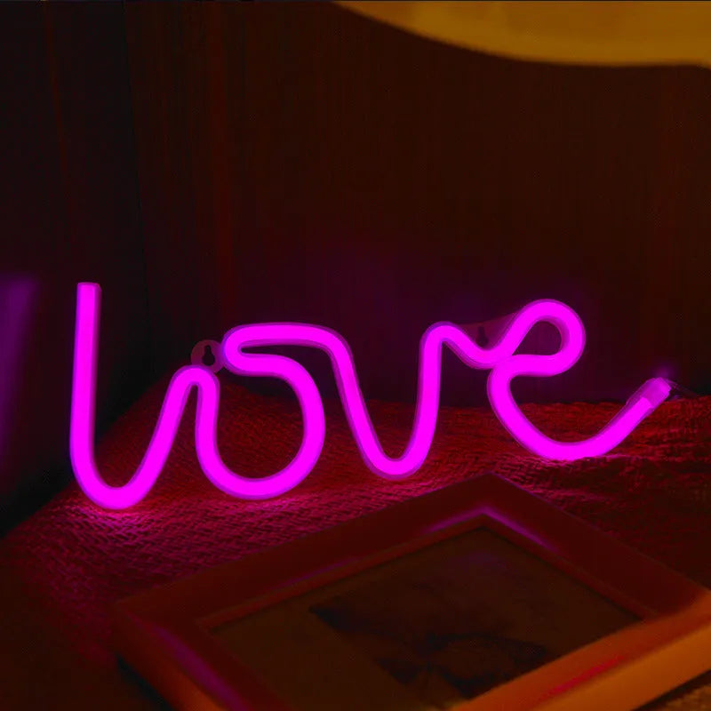 LED neon sign light in Love shape with pink or warm white colour options, powered by battery or USB