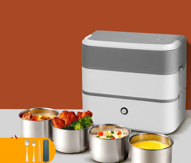 Pink and white double-layer pluggable heated lunch box with stainless steel interior and push-button controls.
