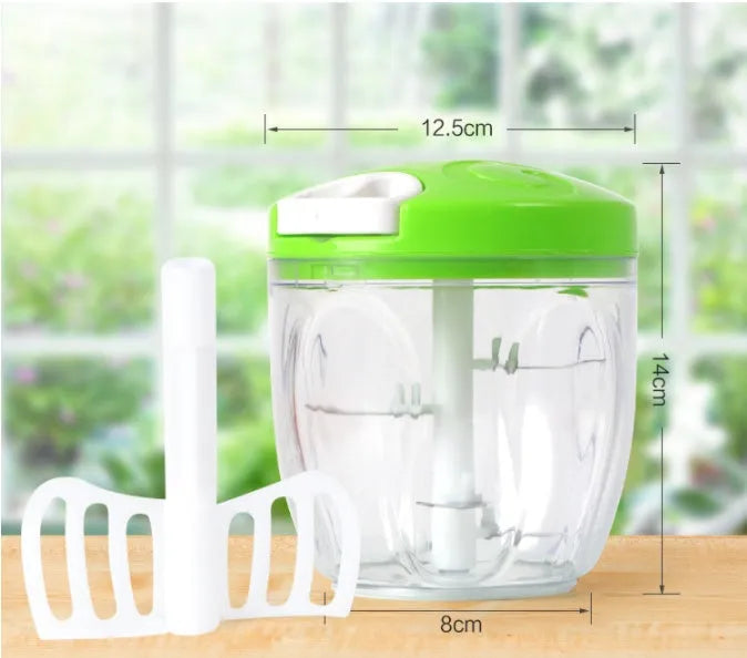 Green manual kitchen chopper with three stainless steel blades and a 500ml container.