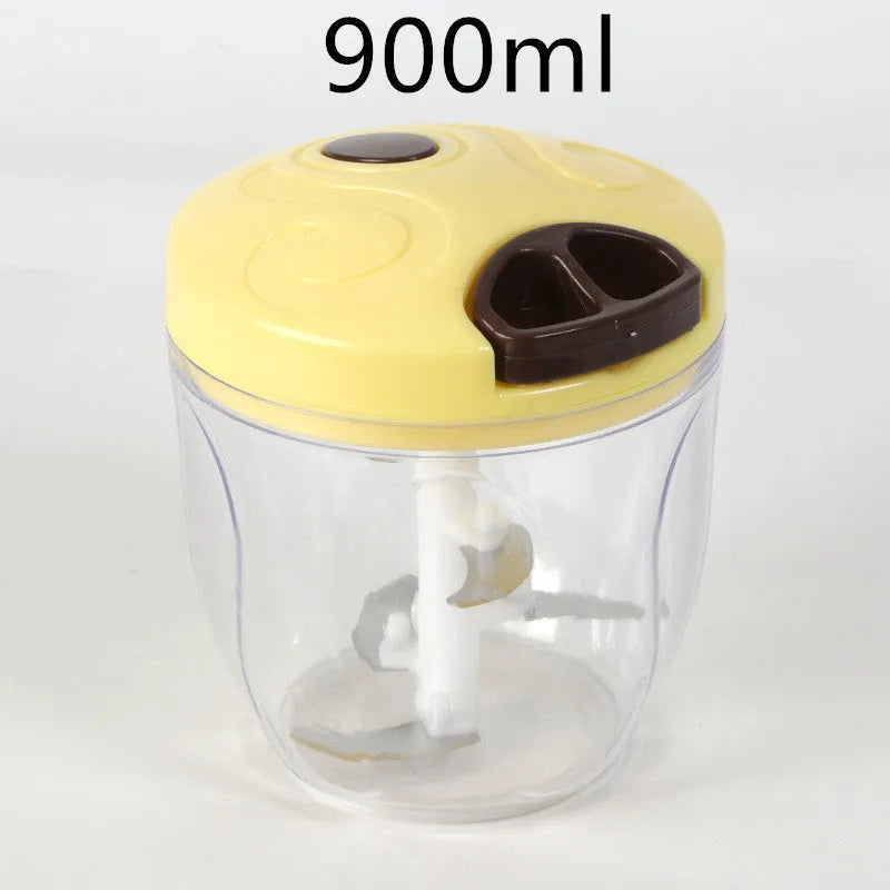 Green manual kitchen chopper with three stainless steel blades and a 500ml container.