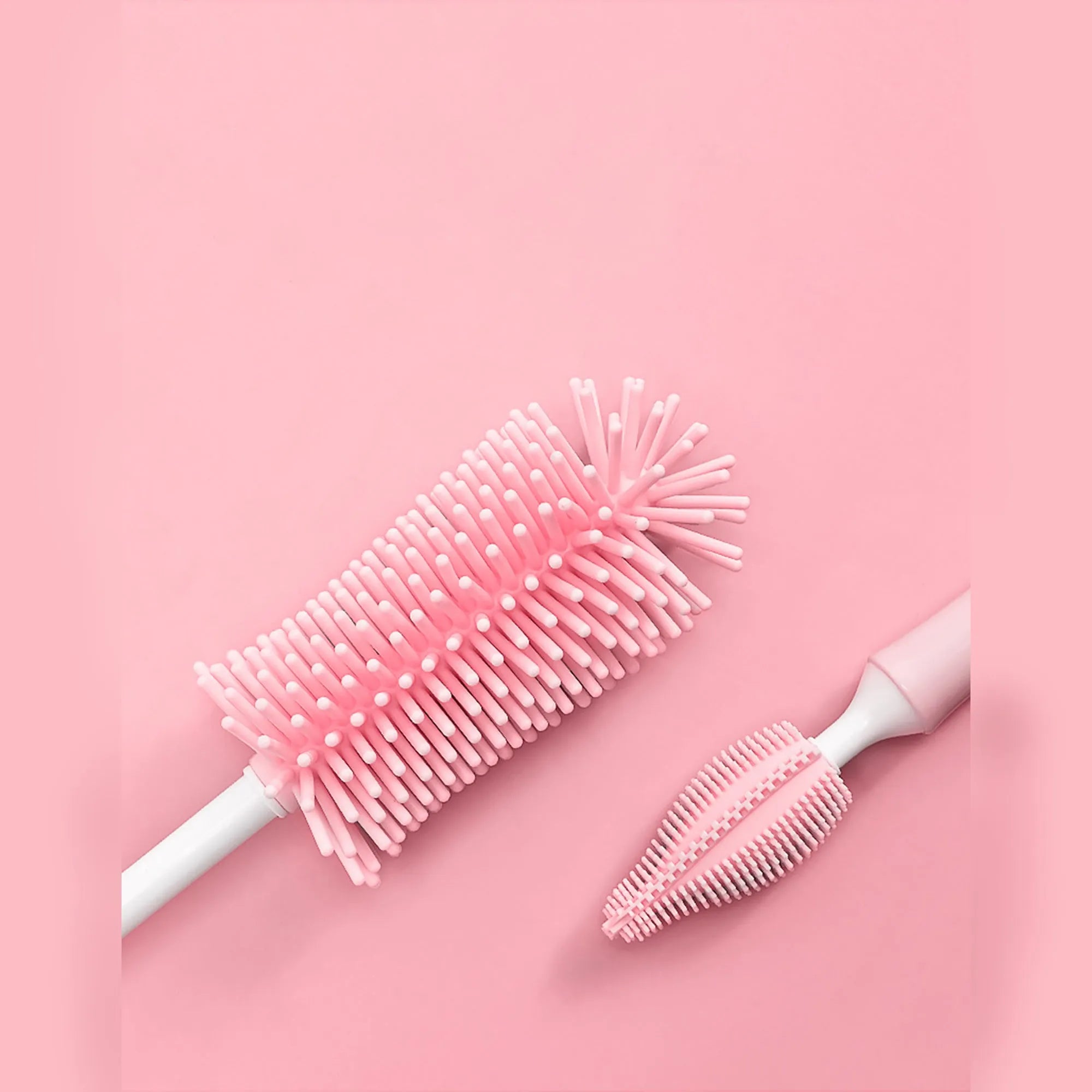 Silicone baby bottle cleaning brush set in pink, blue and yellow colours with different brush heads