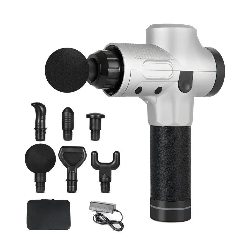 Black electric muscle massage gun with set of seven different interchangeable head attachments on a grey background