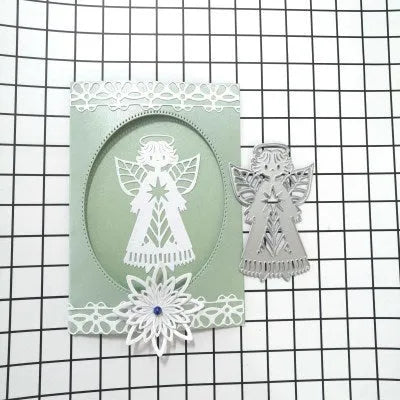 Carbon steel angel embossing mould with character design measuring 8 by 6 centimetres