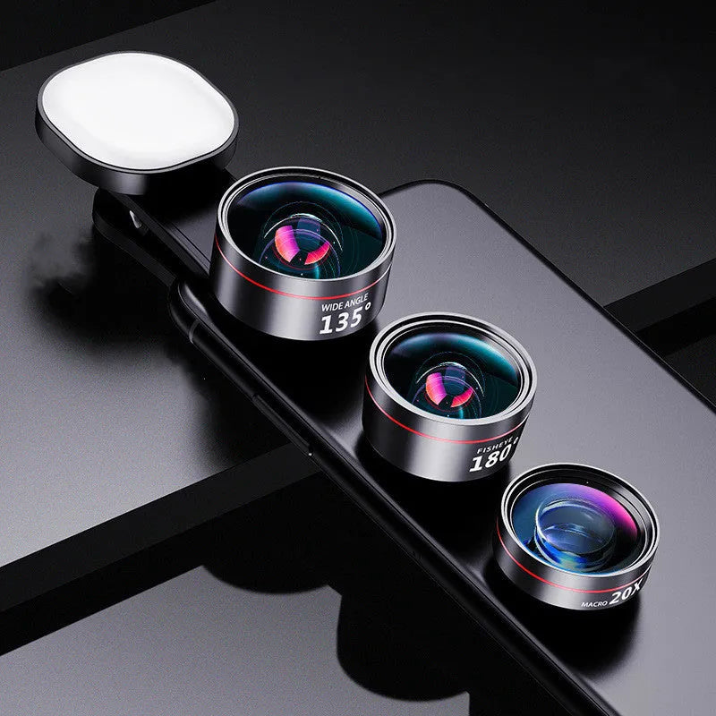 Smartphone camera lens kit with LED fill light attached to mobile phone showing wide angle and macro lenses