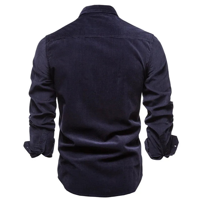 Men's long sleeve linen shirt in Denim Blue on a hanger, showing button front and smart casual style.