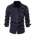 Men's long sleeve linen shirt in Denim Blue on a hanger, showing button front and smart casual style.