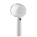White rechargeable clothes shaver and beater on a plain background.