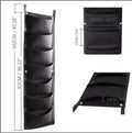 Vertical felt wall planter with 18 green planting pockets for herbs and flowers