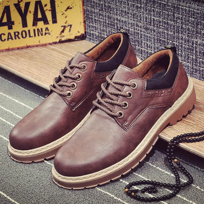 Men's black casual shoes with round toe and front-tie lacing on rubber soles