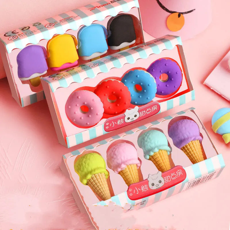 Set of twelve colourful cartoon food-shaped erasers including ice creams, doughnuts, and lollipops.