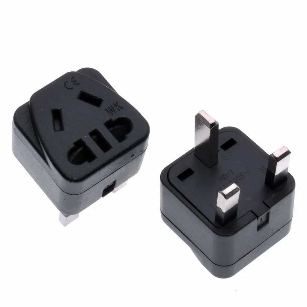 Square three plug power adapter with UK plug socket and international plug pins