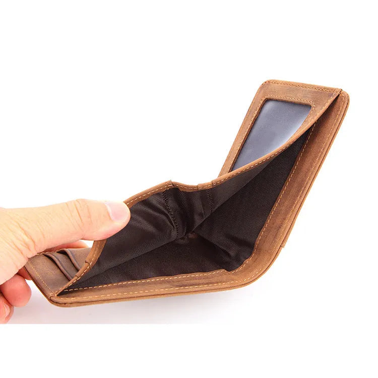 Brown mini men's leather RFID wallet showing card slots and cash pocket.