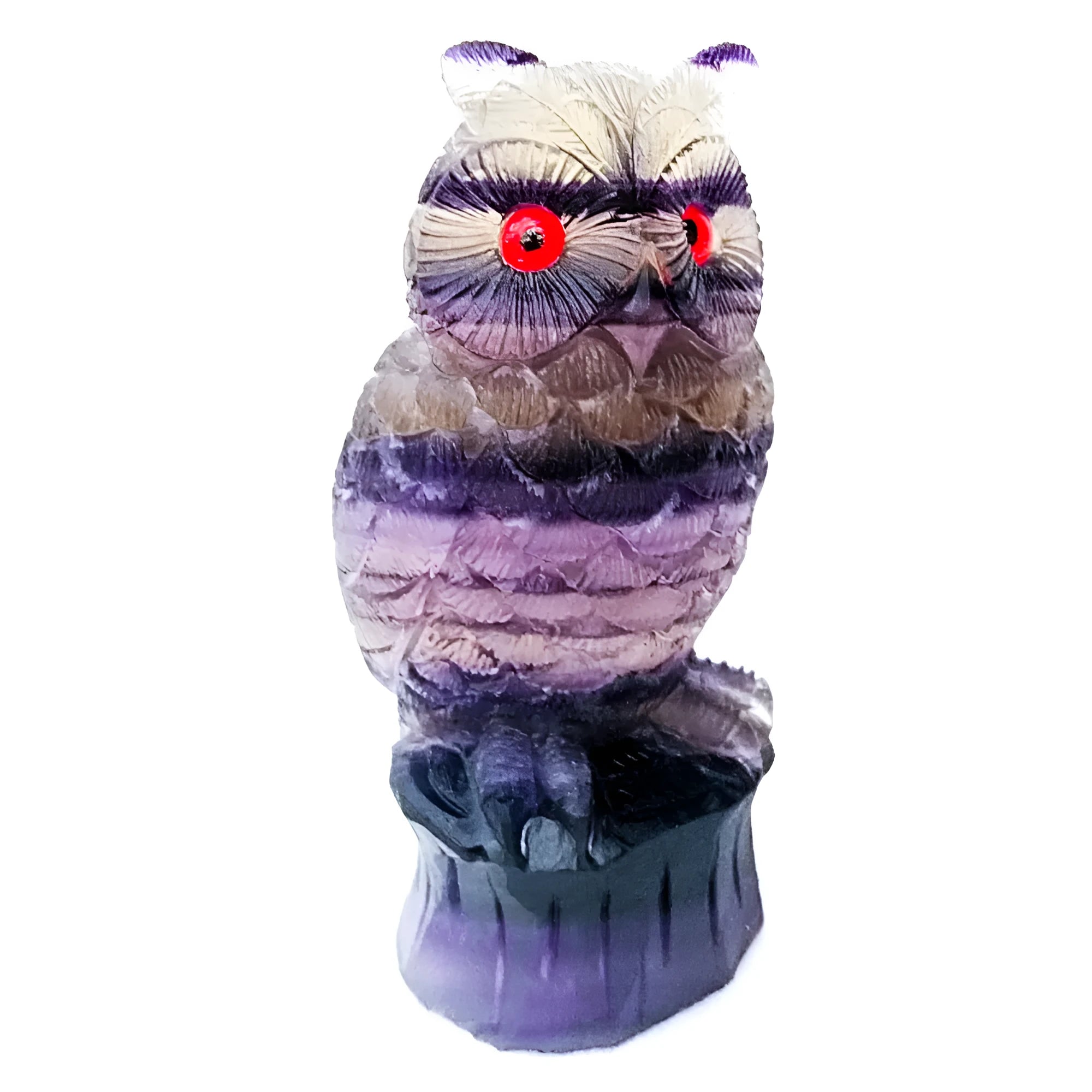 Hand carved purple fluorite owl ornament on a neutral background, showing detailed carving and natural crystal colour.