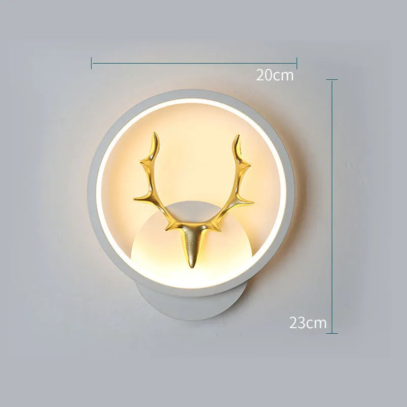 Nordic deer antler shaped wall lamp with remote control on a white wall.