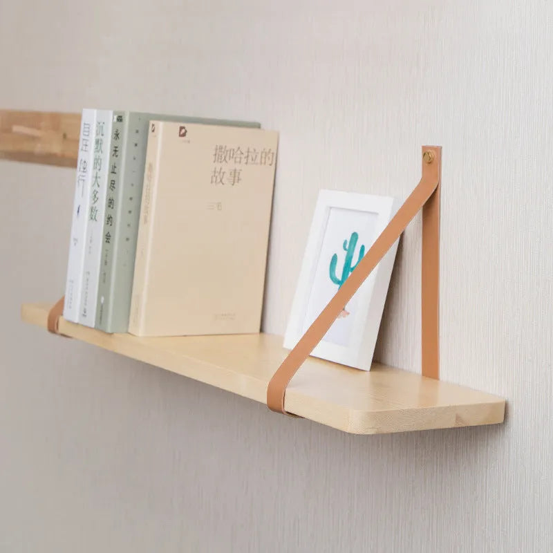 Pine wood wall-mounted storage rack or bookshelf with Nordic style design.