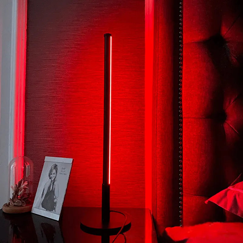 Nordic minimalist black LED bedside lamp with remote control showing RGB colour display