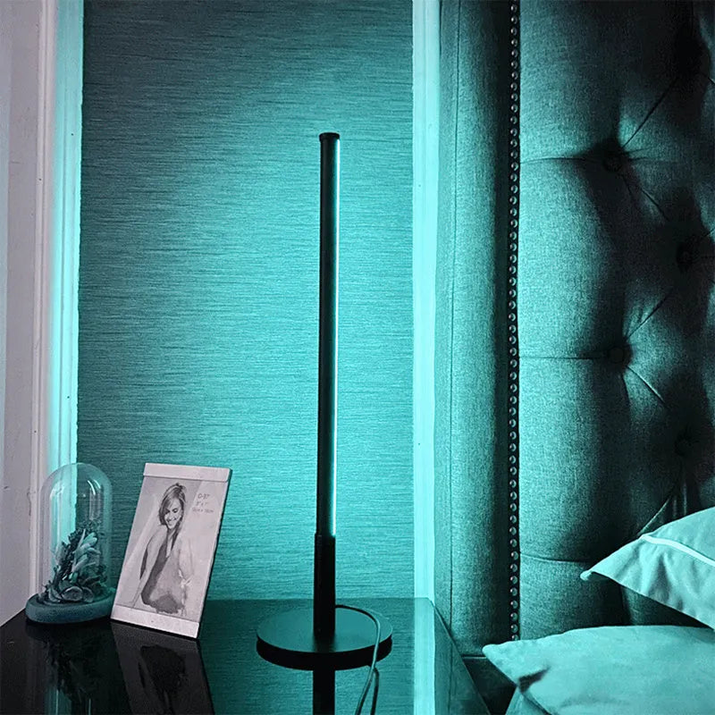 Nordic minimalist black LED bedside lamp with remote control showing RGB colour display