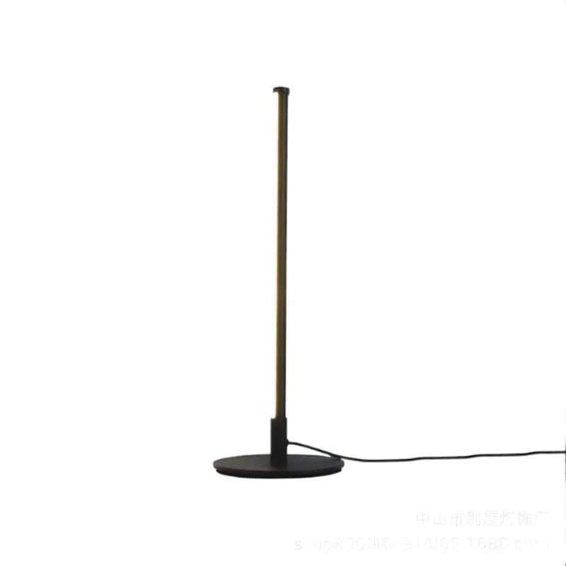 Nordic minimalist black LED bedside lamp with remote control showing RGB colour display