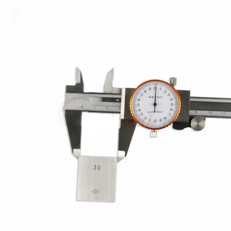 Black and white plastic vernier caliper showing 0-150mm measurement scale with stainless steel components