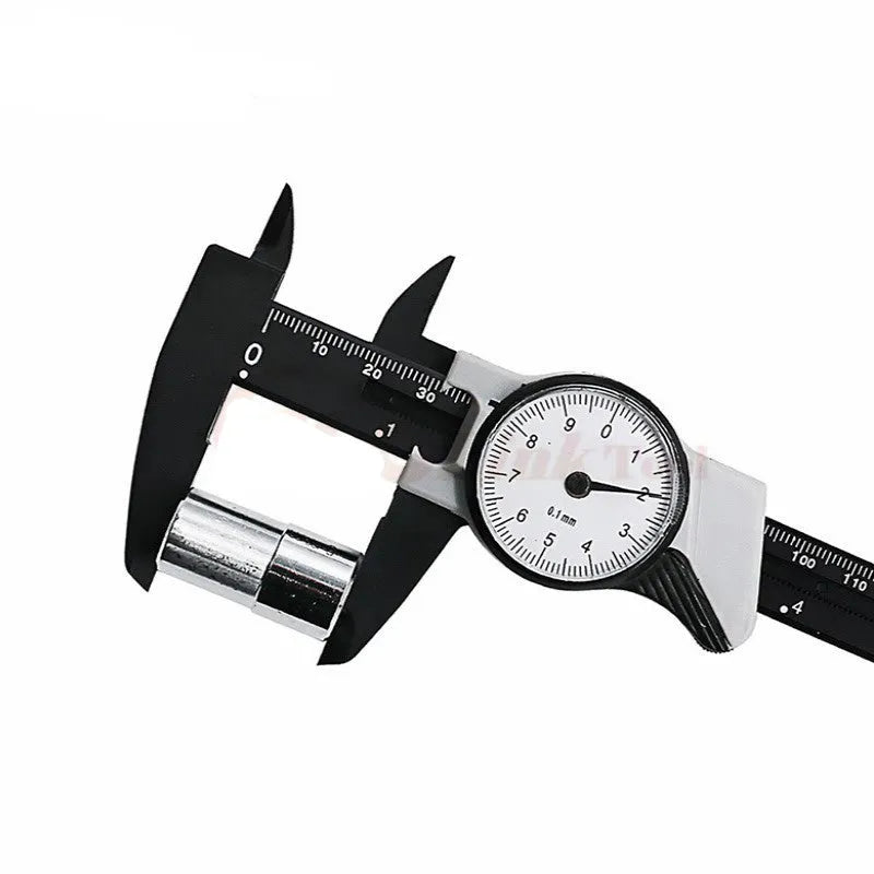 Black and white plastic vernier caliper showing 0-150mm measurement scale with stainless steel components