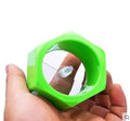 Yellow and green plastic spiral vegetable cutter for slicing cucumbers.
