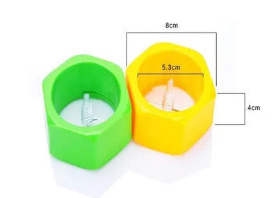 Yellow and green plastic spiral vegetable cutter for slicing cucumbers.