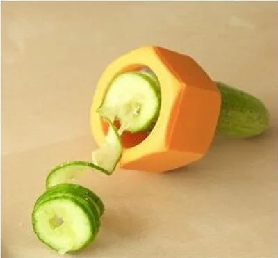 Yellow and green plastic spiral vegetable cutter for slicing cucumbers.