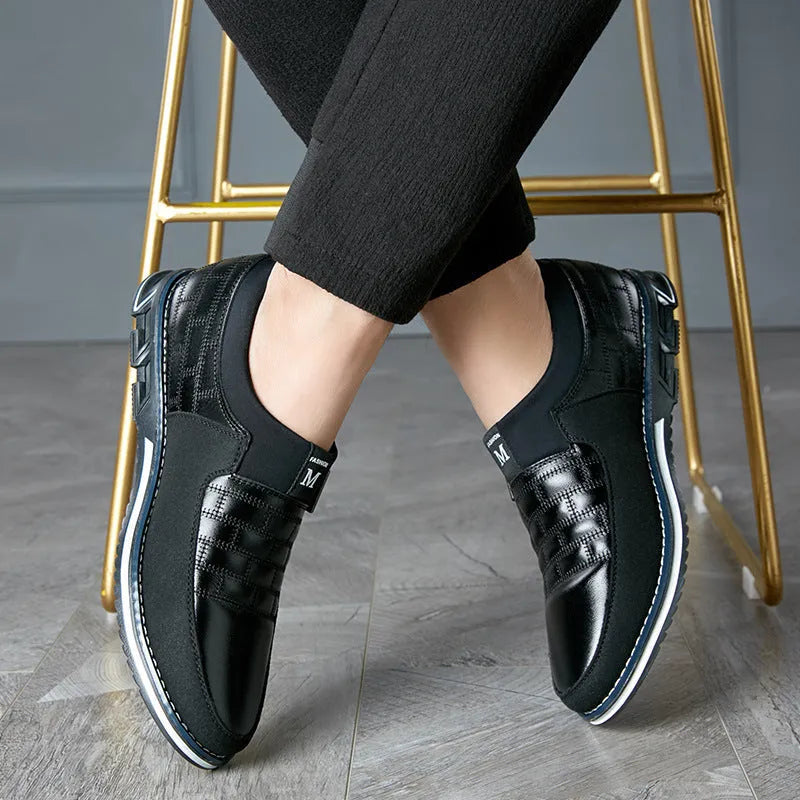 Men's blue casual leather shoes with low-cut design showing imitation leather upper and viscose sole