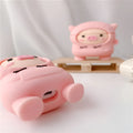 Pink silicone AirPods case with cartoon pig design and hook attachment for AirPods 1, 2, and Pro