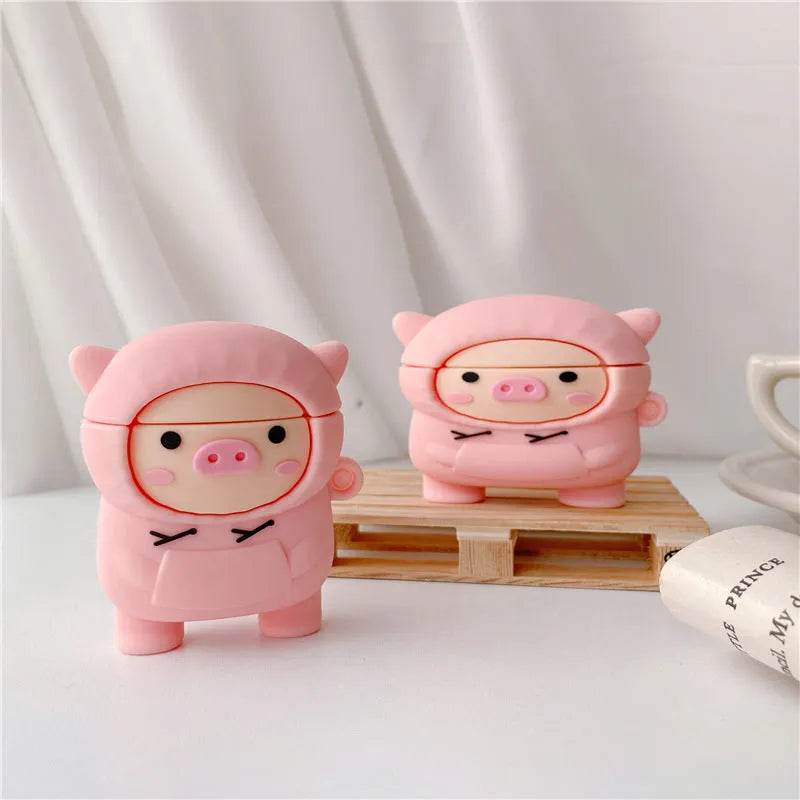 Pink silicone AirPods case with cartoon pig design and hook attachment for AirPods 1, 2, and Pro