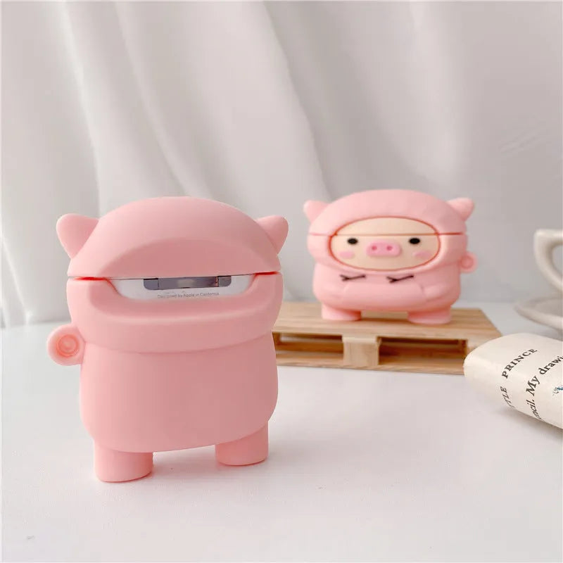 Pink silicone AirPods case with cartoon pig design and hook attachment for AirPods 1, 2, and Pro
