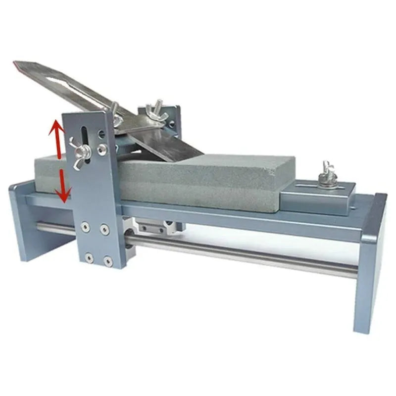 Aluminium alloy fixed angle sharpening tool for woodworking chisels and planer blades on a workbench.
