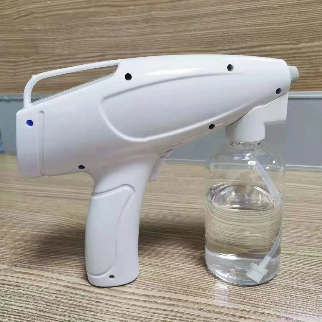 White handheld cordless electric spray gun with USB-C charging port and anti-clogging nozzle