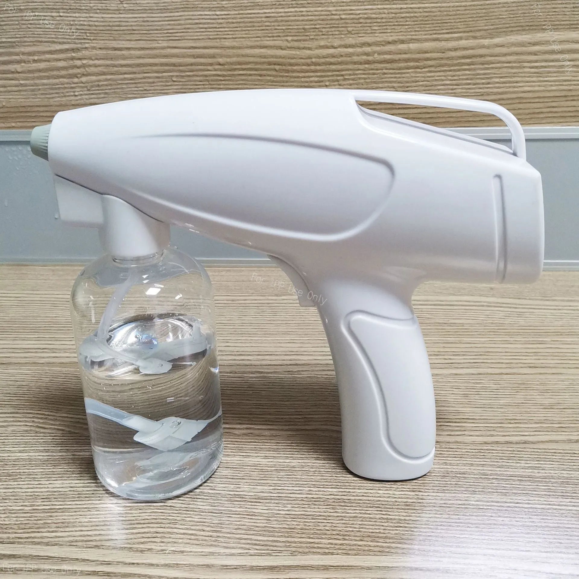 White handheld cordless electric spray gun with USB-C charging port and anti-clogging nozzle