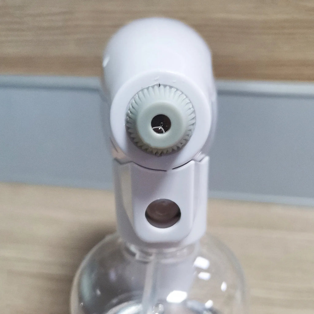 White handheld cordless electric spray gun with USB-C charging port and anti-clogging nozzle