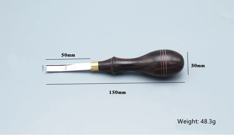 Leather hand tool for barbers with wide shovel edge thinning knife and drum shovel.