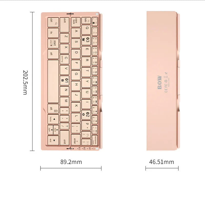 Silver white folding Bluetooth keyboard with built-in stand holding a tablet