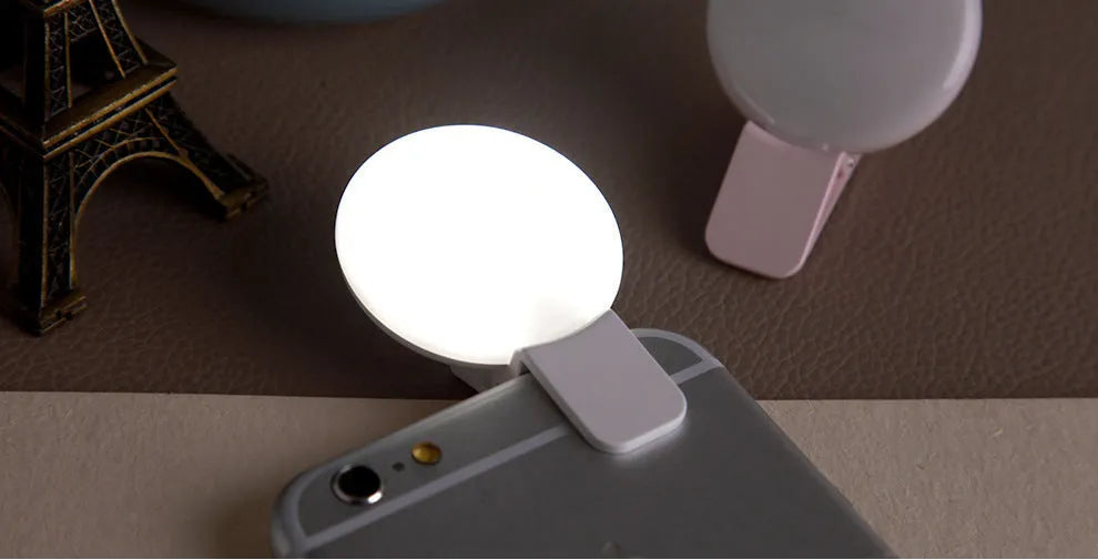 Round fill light for mobile phone selfies in black, pink, and white options