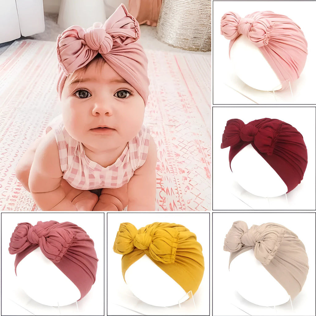 Soft acrylic knitted baby hat for girls in a solid colour, fitting head circumference 35-48 cm