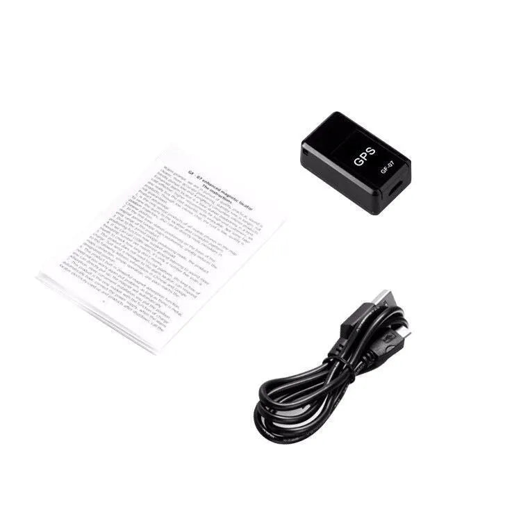 Black magnetic mini GPS tracker device with compact 35mm dimensions for vehicle tracking