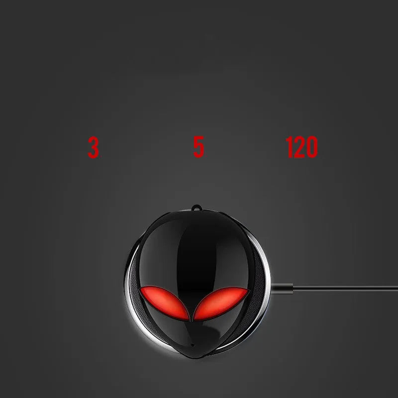 Creative Outer T8 Starman alien-design Bluetooth earbuds with red LED lights and wireless charging case.