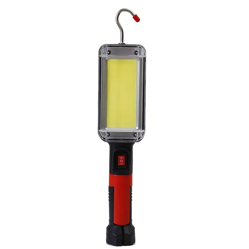 Red portable COB rechargeable flashlight with magnetic base, shown with USB charging cable.