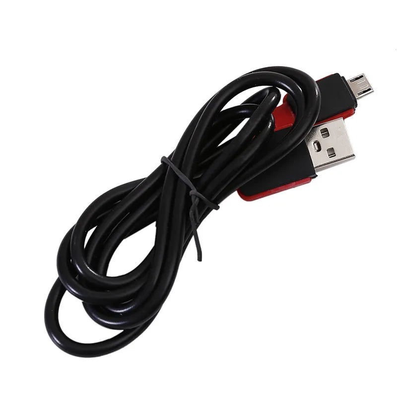 Red portable COB rechargeable flashlight with magnetic base, shown with USB charging cable.