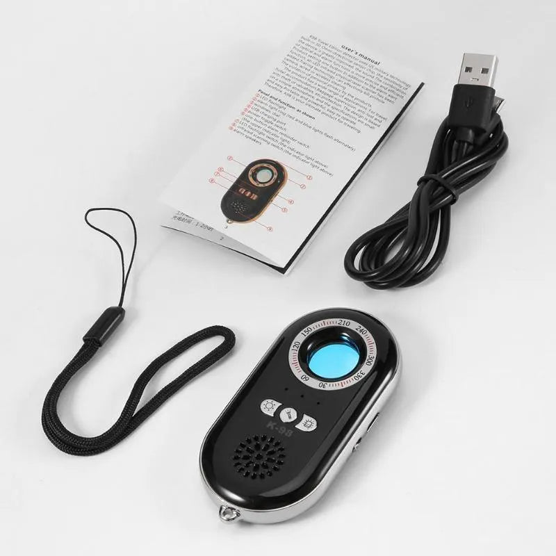 Compact black wireless signal detector measuring 85mm with vibration alarm for travel security