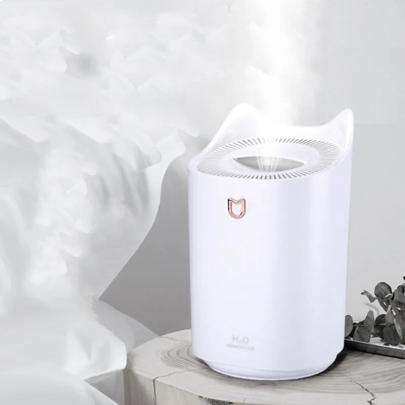 Double spray humidifier with three mist outlets in coral pink or glacier white colour